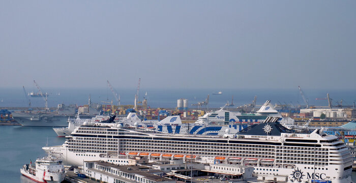 Genoa, Italy - June 2025: passenger ship MSC and ferry boats  GNV and Moby moored in the port. 
