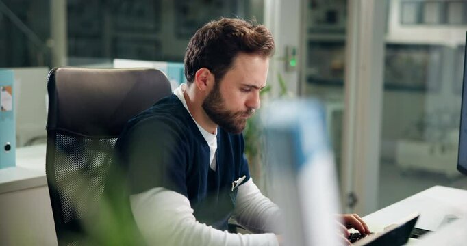 Doctor, computer and surgery notes in hospital, edit or check digital medical records with typing. Surgeon man, electronic details or info for healthcare, treatment and admin in office for update