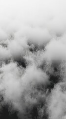 A dense formation of fluffy, white clouds fills the entire frame, creating a dramatic and ethereal atmosphere