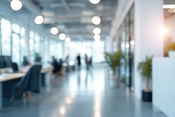 A modern office space with bright lighting, open layout, and employees working in a collaborative environment