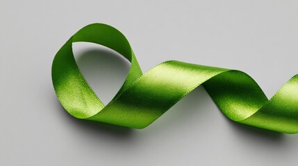 Green Satin Ribbon Symbolizing World Lymphoma Awareness and Global Health Support Initiative
