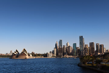 skyline view of the Sydney city center downtown by the park near Sydney Opera house