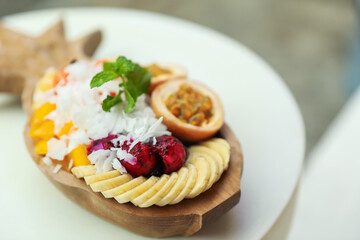 Different fresh fruits on white table, closeup. Space for text