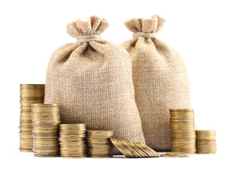 Bags and stacked coins isolated on white