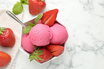 Refreshing sorbet, strawberries and mint in bowl on white marble table, flat lay. Space for text