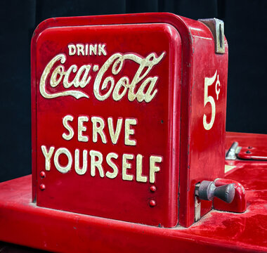 June 11, 2025. Top portion of an antique Coca-Cola self serve vending dispenser. At the time, the cost was five cents.