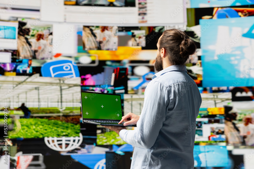 Poster social media manager uses device with isolated display for online presence, using his imagination an