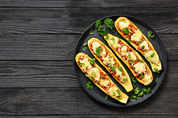 stuffed zucchini boats filled with bolognese sauce