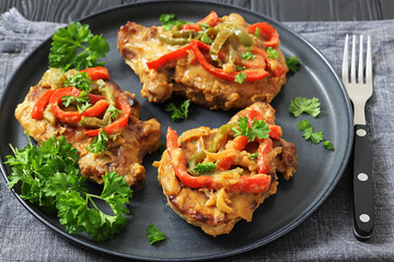 pork chops topped with bell pepper cream gravy