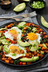 fried sweet potato cubes, eggs, and fresh avocado