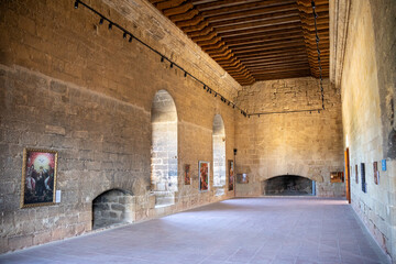 Medieval castle and church interior in Valderrobres, Teruel. Gothic architecture, historic ambiance, and rustic charm.