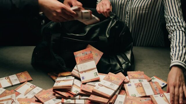 Banknotes and bag counter, Specialised police officer Counting dollar euro banknotes in crime lab with machine, cashed out criminal money, bitcoin changing, buying home flat in bank. 