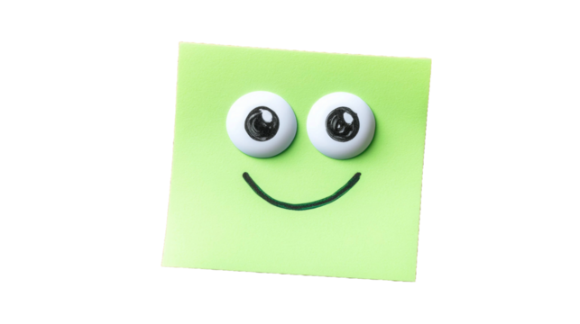 Happy green sticky note with googly eyes and a smiling face on a transparent background for creative projects