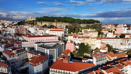 Obraz premium Sao Jorge Castle At Lisbon In Lisbon District Portugal. Medieval Castle Scenery. Ancient Cityscape. Sao Jorge Castle At Lisbon In Portugal. Historical City Landscape. Tourism Travel Landscape.