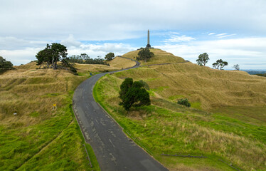 View of the road leading to the monument atop One Tree Hill, a prominent landmark in Auckland, New...