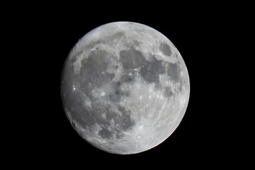 full moon over black