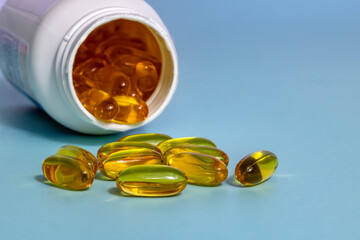 Fish Oil Supplement on a Blue Background