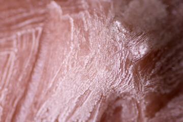 Fototapeta premium Macro texture of frost or ice crystals especially on frozen food. This is caused by moisture inside the food itself or inside the freezer
