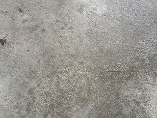 textured concrete surface with subtle variations in color and pattern, creating industrial feel