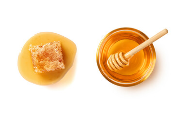 Honey in a glass bowl with honeycomb isolated on white background. Top view
