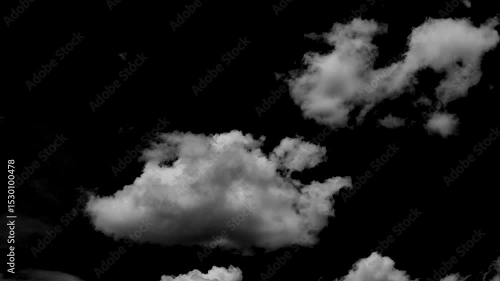 Wall mural time-lapse of separate white clouds on a black background shows real clouds.