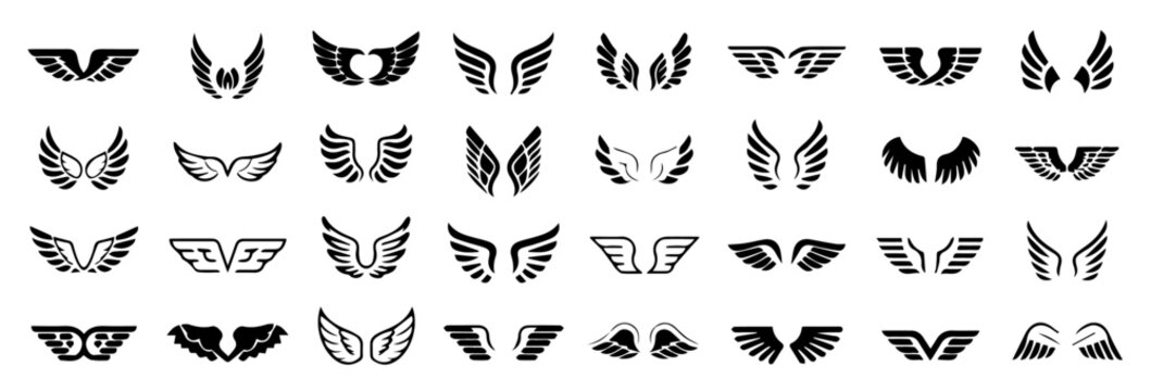 Set of black and white stylized wing icons in various symmetrical designs, arranged in a grid on a white background, featuring abstract, angelic, and geometric wing shapes for creative use.