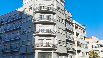 Art Deco Residential Building with Rounded Balconies and Urban Charm