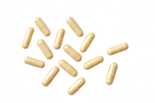 Collection of beige dietary capsules scattered isolated on transparent background