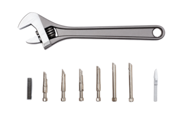 Tool collection flat lay: adjustable wrench & T-bar Allen keys, no background
