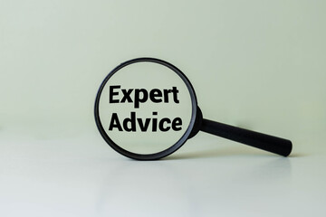 Expert advice symbol. Concept word Expert advice on magnifying glass.