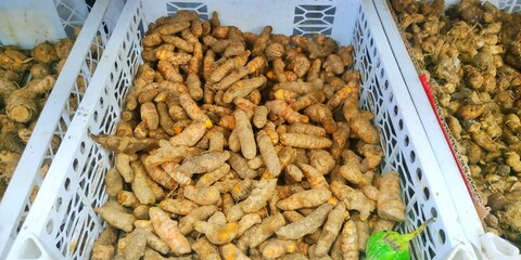 Bountiful Harvest of Fresh Turmeric in Baskets at Indonesian Traditional Market, Ready for Culinary and Medicinal Use.
Suitable for Healthy Food Theme, Food Ingredients, Herbal Medicine Theme