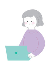 パソコンを使うシニア女性