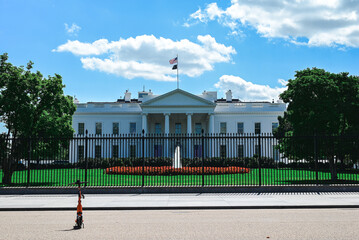 Obraz premium White House, Presidential Residence, North Lawn, Executive Mansion, Pennsylvania Avenue, neoclassical façade, American flag, D.C. architecture, iconic landmark, Garden Gate 