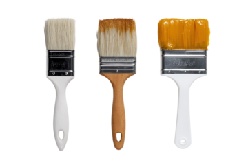 Top-view painting trio isolated — brush, tape, sponge