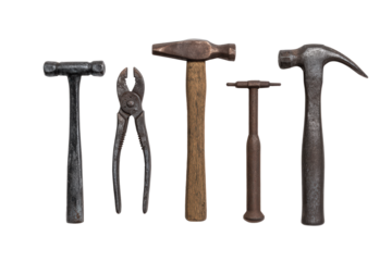 Pliers, nails & hammer on white