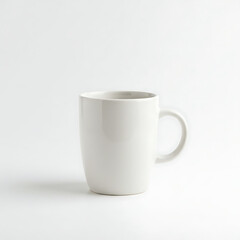 Fototapeta premium A clean, simple white ceramic mug or coffee cup isolated on a plain white background. A minimalist object perfect for branding mockups. 