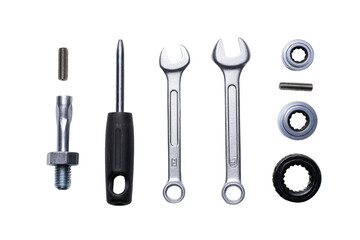 Flat-lay set – screwdriver, wrench, bolts & washers, no background