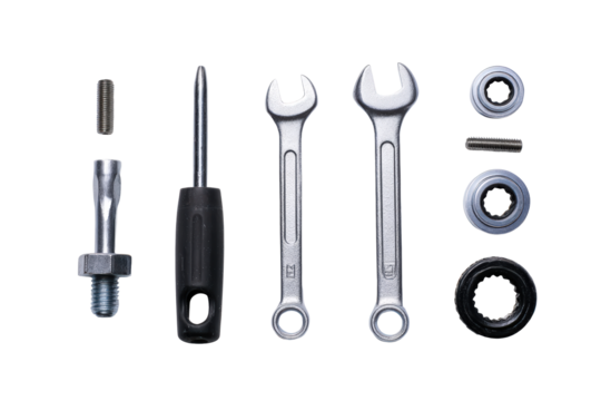 Flat-lay set – screwdriver, wrench, bolts & washers, no background