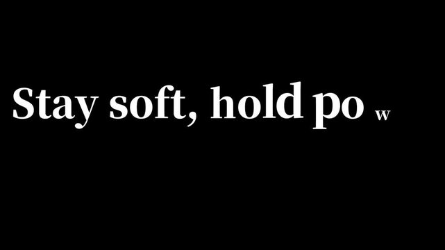 Stay soft comma hold power text in white font against a black background simple motivational quote .