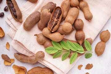Heap of tasty tamarinds on white background