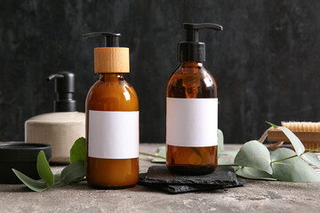 Bottles of shampoo on table