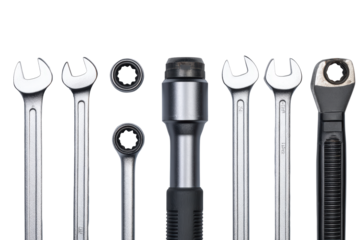 Flat-lay composition of torque wrench, Allen keys & spanner on transparent background