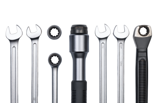 Flat-lay composition of torque wrench, Allen keys & spanner on transparent background