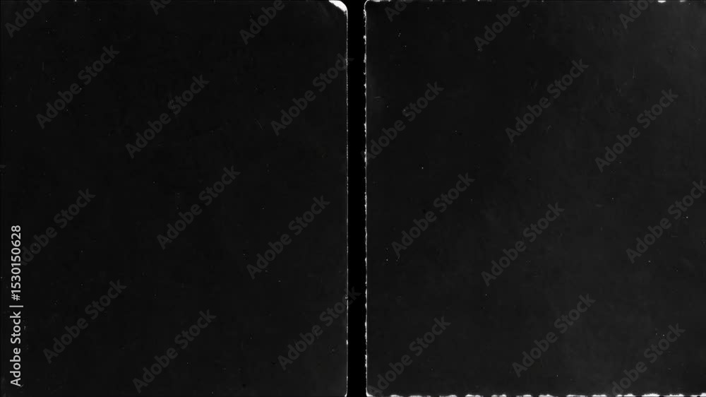 Aufkleber aged black paper surface with torn edges, creating a textured background or overlay with a vintage a