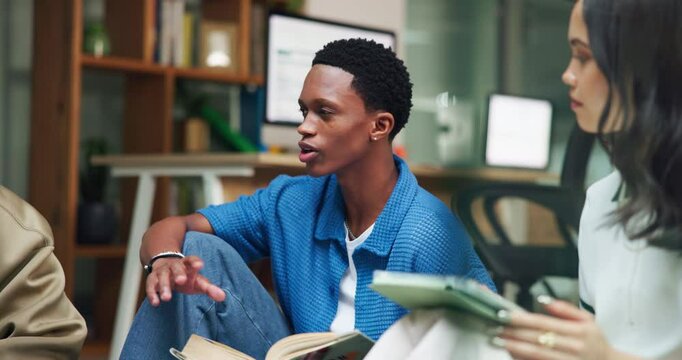 Man, students and talking with book in library for research, study session and education at college. Group, friends and laptop for project, assignment and test preparation with information on thesis