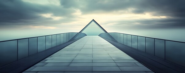 Modern bridge extending into a cloudy sky.