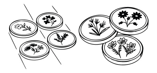 Elegant black and white floral botanical coin design illustration featuring various stylized flower and plant silhouettes suitable for decorative purposes.
