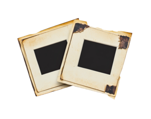 Two vintage, faded, and slightly damaged slide frames