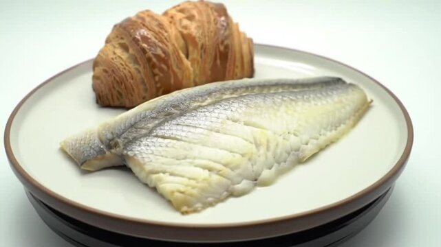 Herring Fillet and Croissant: A Unique European Breakfast