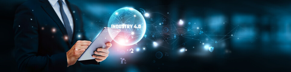 Smart manufacturing concept. Businessman manage and analysis of growth graph data on industrial...